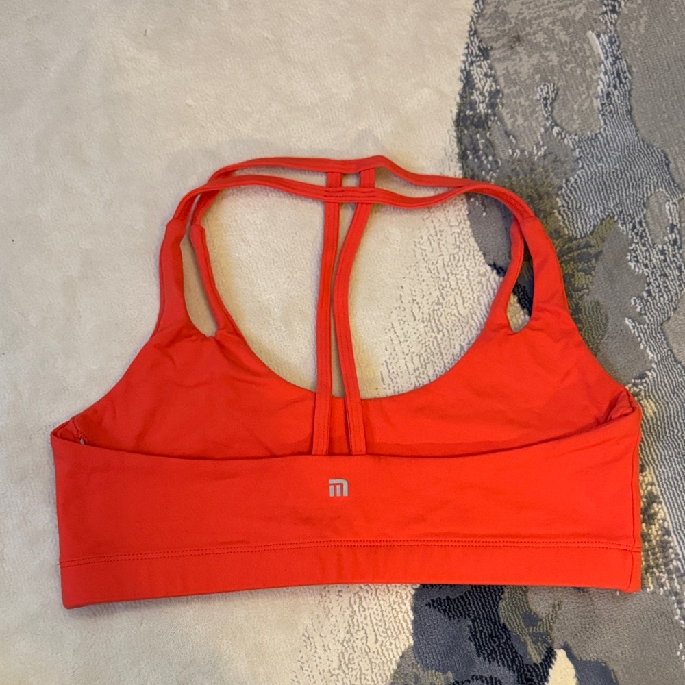 Coral colored Montiel Sports bra size small (4-6)